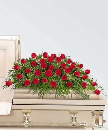 36 red roses in a casket spray