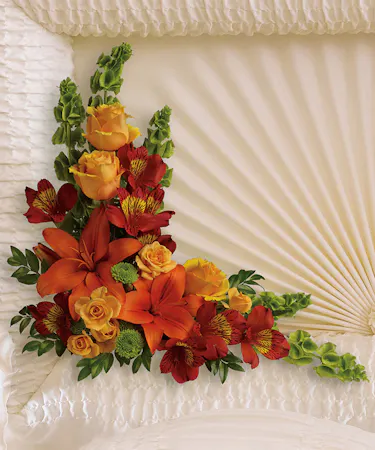 Casket Lid Floral Insert in oranges, reds and green designed with roses,  spray roses, lilies