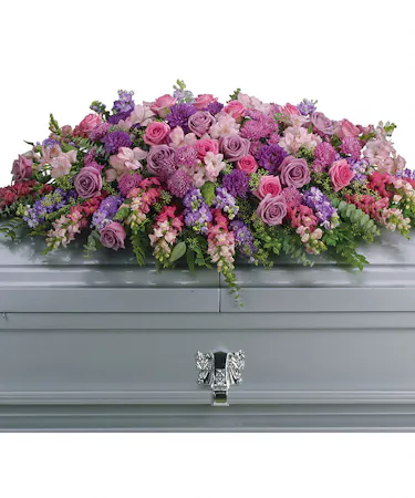 Full Couch Casket Spray in Pink & Purple with Roses & More