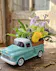 Ceramic 57 chevy truck container with green and yellow flowers