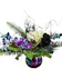 Black opalescent vase with black roses, blue dendrobium orchids, white hydrangea, lush greenery, curly willow