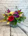 a romantic lush bouquet in purples, lavenders and pinks which also includes 2 handmade truffles in gold boxes