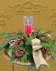Beautiful red, gold & green centerpiece with a hurricane and pillar candle