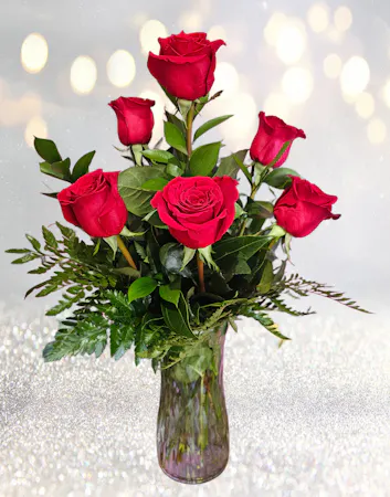 6 roses in a vase