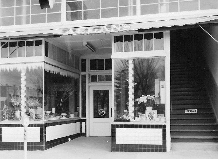A classic black-and-white photo of our beloved storefront